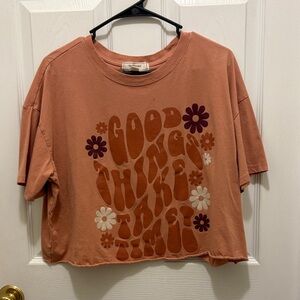 Peach Graphic Tee with Floral Design